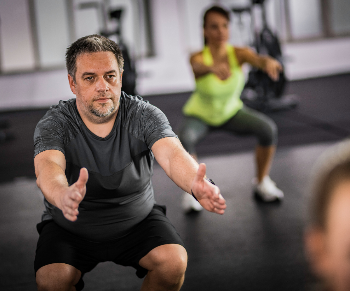 Man performing squat exercise