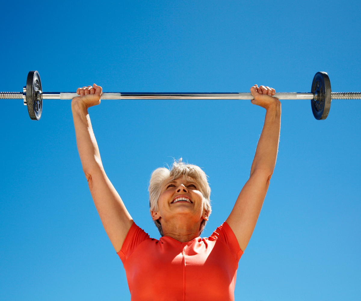 Woman training with barbell